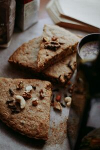 Homemade nutty cake slices with a cup of coffee, perfect for a cozy dessert moment.